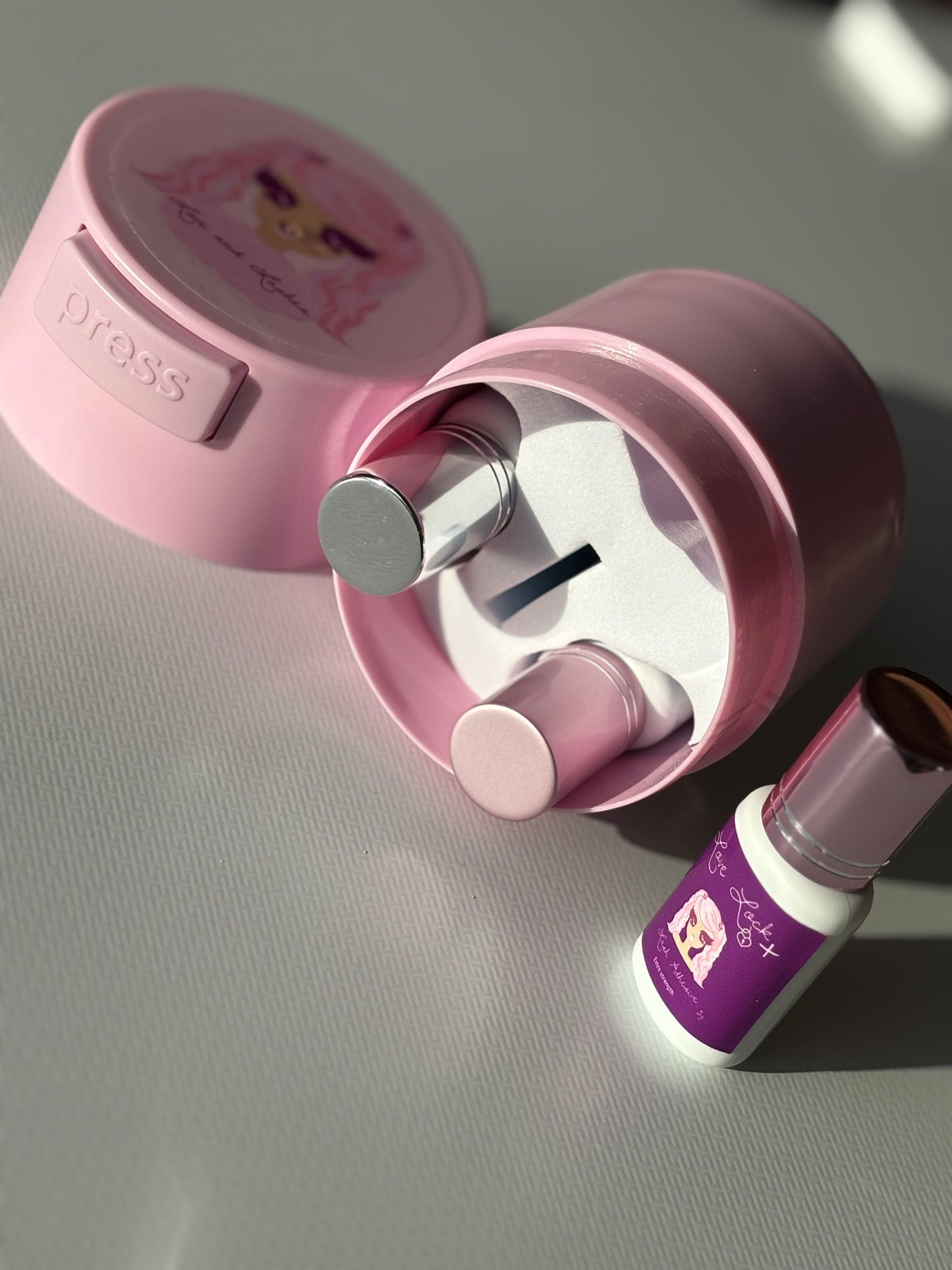 Adhesive storage container vacuum sealed